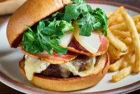 Brie Burger with Bourbon-Poached Pears and Crispy Pancetta