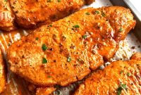 Juicy Oven-Baked Pork Chops with Garlic and Herbs