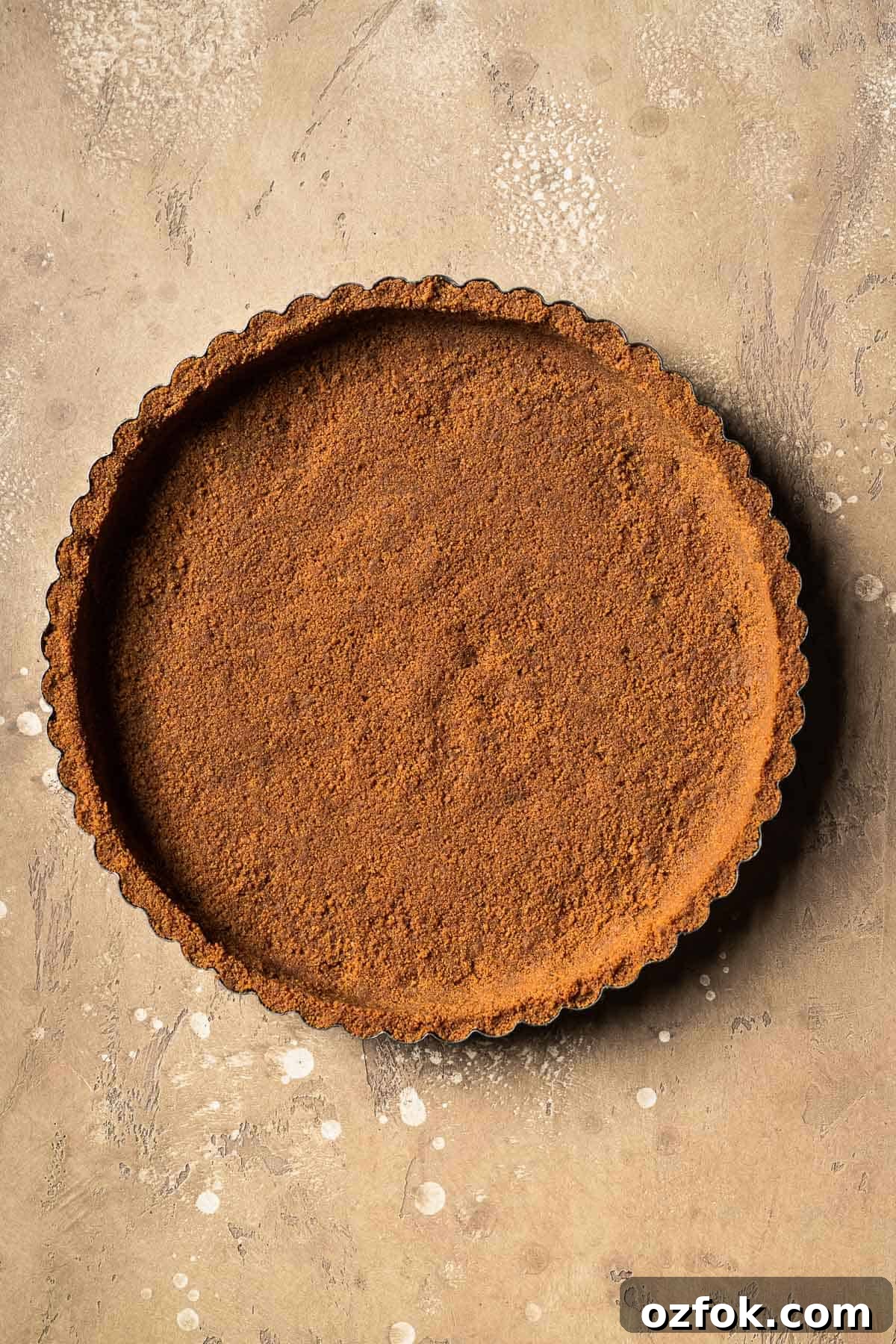 Banoffee Tart Recipe: Caramelized Banana Tart with Buttery Crust 5 A baked biscoff cookie tart crust.