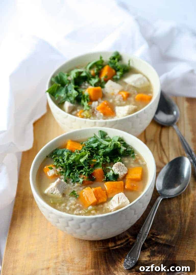Turkey, Sweet Potato & Kale Buckwheat Soup Recipe 5 Two bowls of soup on a table with two spoons