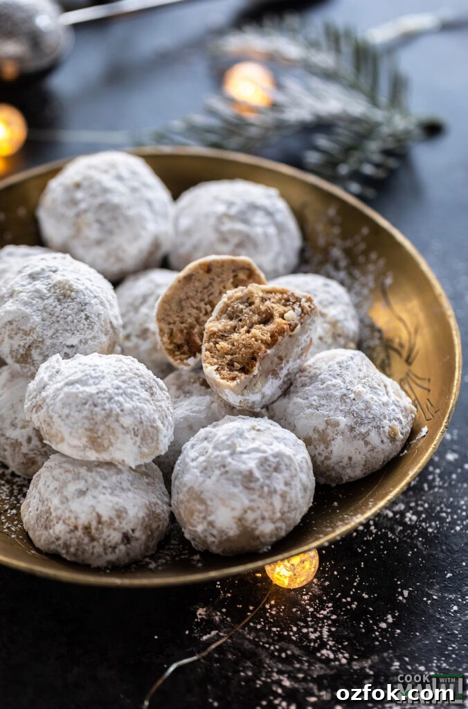 Brown Butter Snowball Cookies Recipe — Buttery, Melt-in-Your-Mouth Treats 6 a snowball cookie cut in half to show the interior
