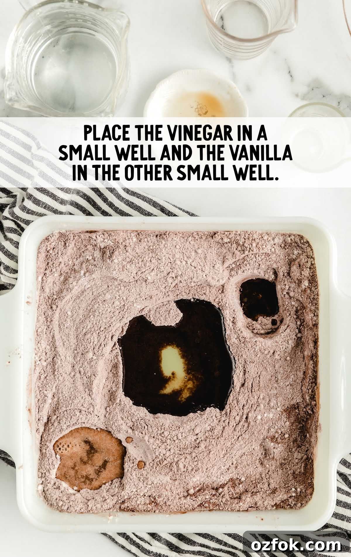 Unfrosted Crazy Cake Recipe — No Eggs, Milk, or Butter Needed 6 vinegar and vanilla placed in the wells in the cake mix
