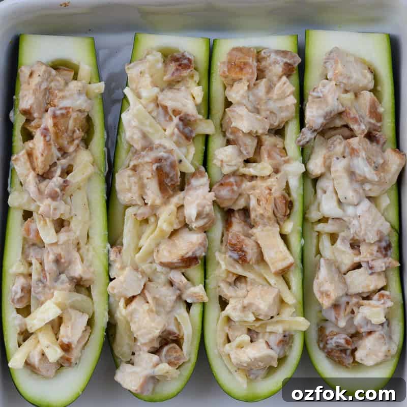 Chicken Alfredo Zucchini Boats Recipe for Low-Carb Dinners 5 Close up of stuffed zucchini boats
