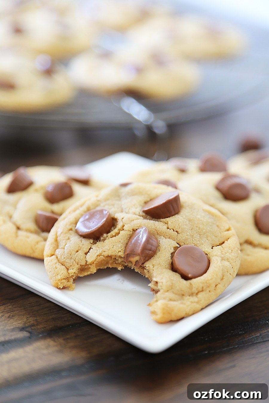 Chewy Peanut Butter Cup Cookies Recipe 4 Soft Peanut Butter Cup Cookies - Perfectly soft and chewy peanut butter cookies, with gooey chocolate peanut butter cups hidden inside! Thecomfortofcooking.com