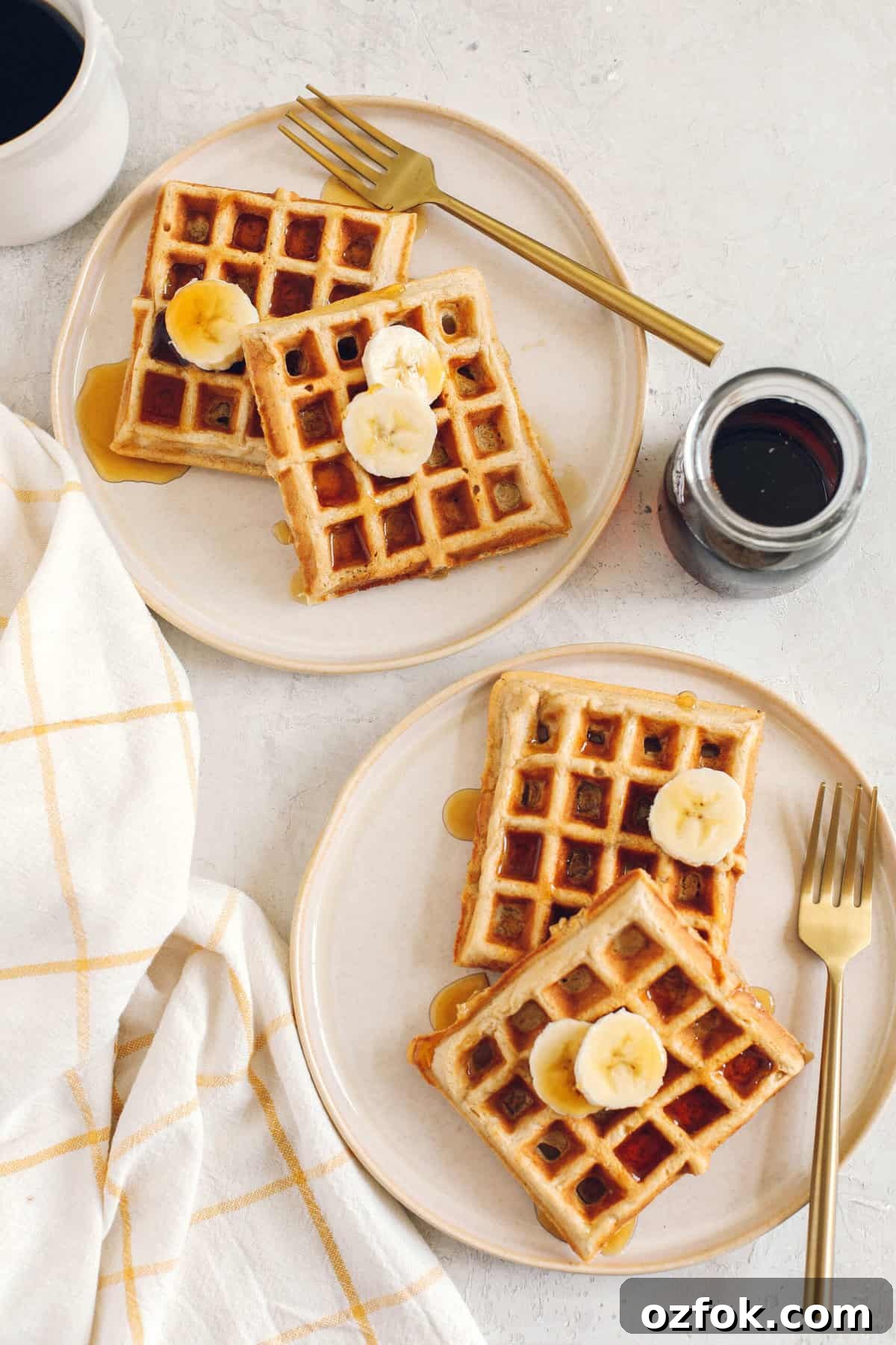 Light and fluffy Whole Wheat Banana Waffles with perfectly crisp edges, warm spices and made with zero refined sugar for the perfect healthy morning breakfast!