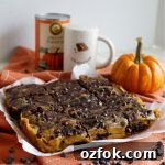 Vegan Pumpkin Swirl Brownies Recipe — Moist & Decadent 8 pumpkin swirl brownies on orange towel