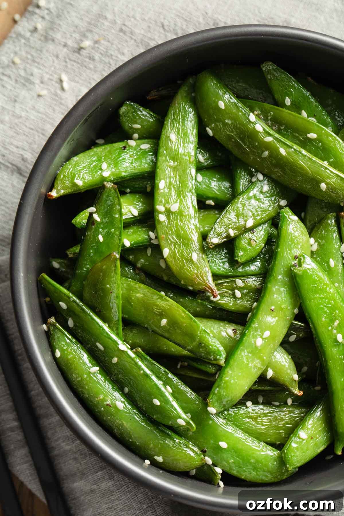 Crispy Air-Fried Snap Peas Recipe (15-Minute Side) 2 Close up view of air fryer roasted snap peas.