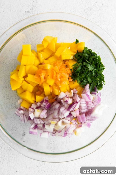 Spicy Mango Habanero Salsa Recipe for Fresh Summer Parties 4 Mango Habanero Salsa ingredients in a bowl