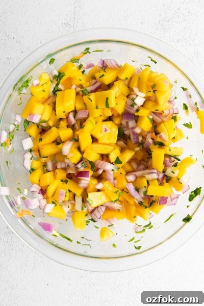 Spicy Mango Habanero Salsa Recipe for Fresh Summer Parties 5 Mango Habanero Salsa mixed up in bowl
