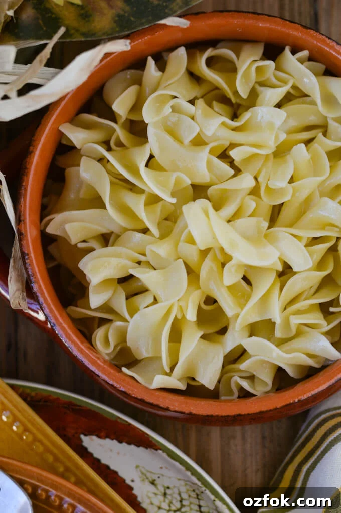 A bowl of buttery egg noddles.