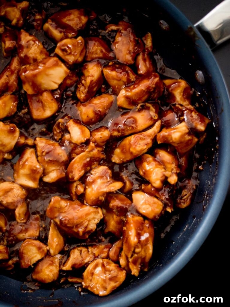 Classic Homemade General Tso's Chicken Recipe for Dinner 7 Close up of the cooked chicken breast chunks cooked in the General Tso chicken.