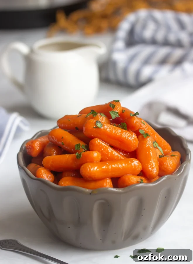 Instant Pot Honey-Glazed Carrots (Video) 11 A bowl of instant pot glazed baby carrots