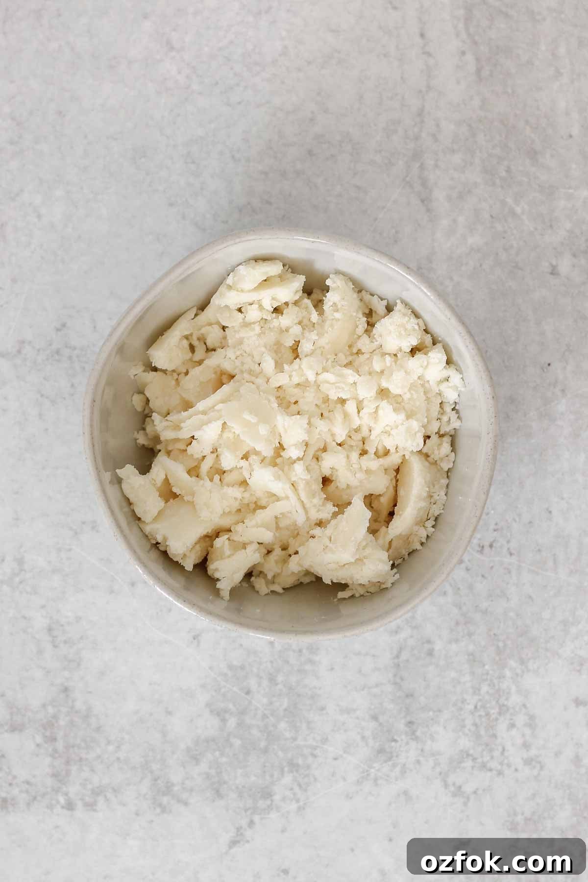 Paleo Coconut Butter Glaze Recipe for Cakes and Donuts 4 Coconut butter in a small ceramic bowl.