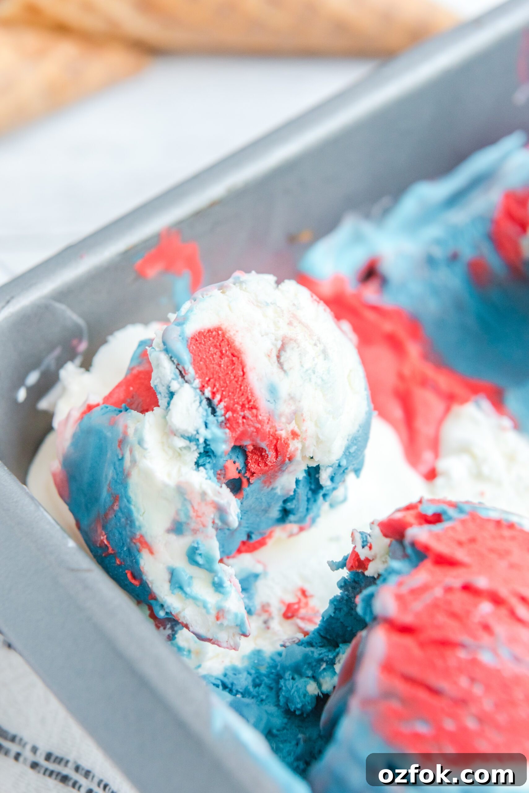 Patriotic Red, White & Blue Ice Cream Recipe for Summer Parties 11 Red, White & Blue Ice Cream in a ice cream tin pan