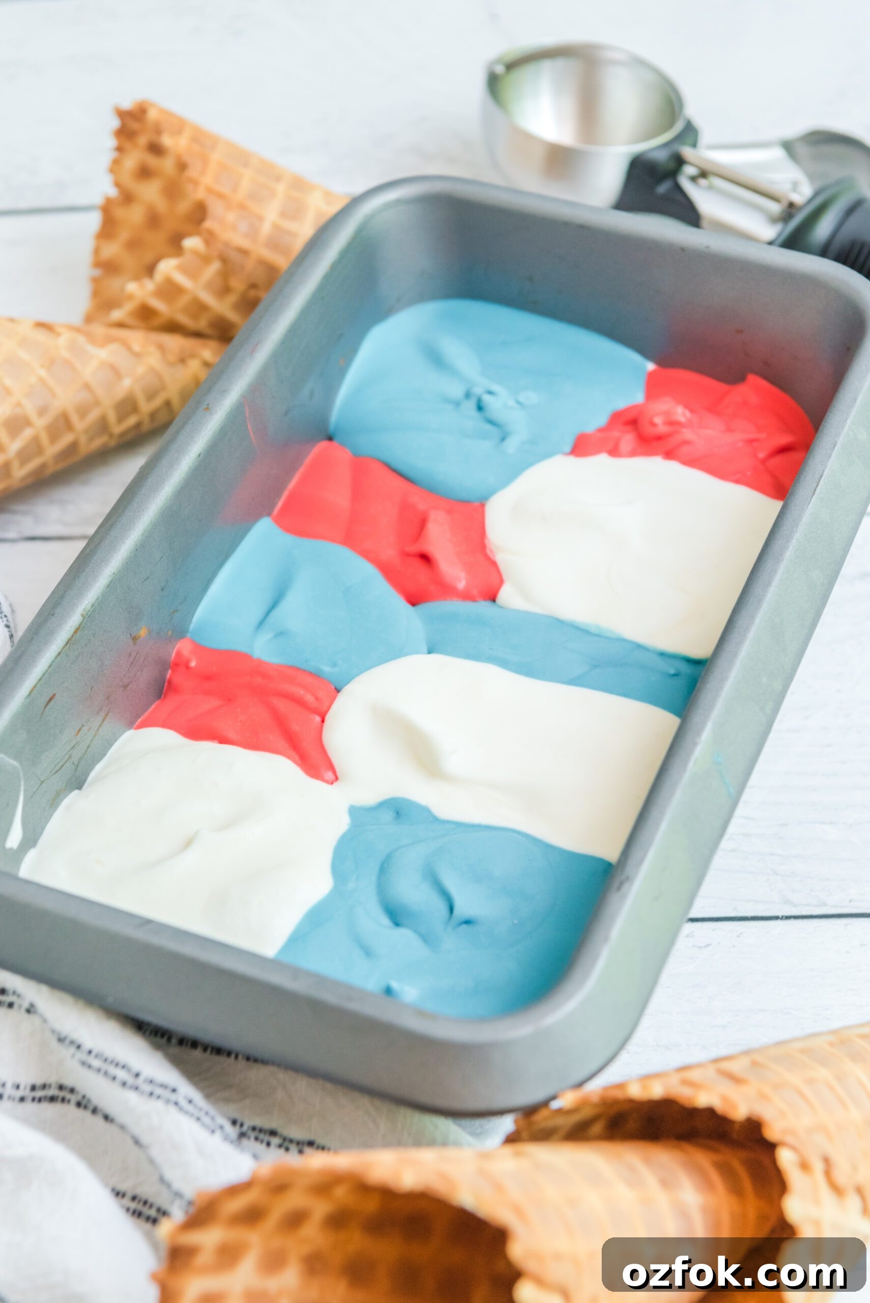 Patriotic Red, White & Blue Ice Cream Recipe for Summer Parties 4 Red, White & Blue Ice Cream in a ice cream tin pan