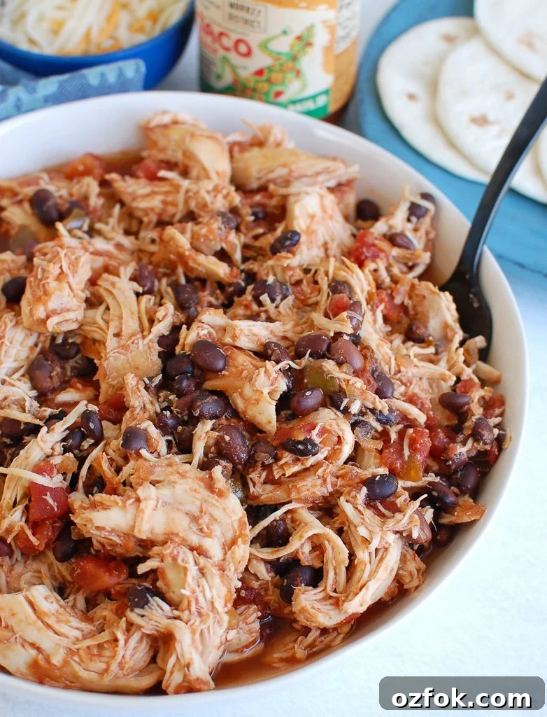 Juicy Slow Cooker Shredded Chicken Recipe for Meal Prep 2 Slow Cooker Shredded Chicken in a white bowl