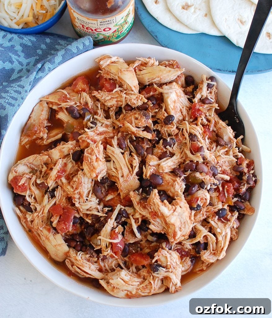 Juicy Slow Cooker Shredded Chicken Recipe for Meal Prep 3 Slow Cooker Shredded Chicken with fork