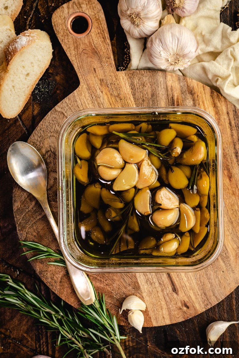 Garlic Confit and How to Make Homemade Garlic-Infused Oil 3 Garlic lovers rejoice: You can make homemade garlic confit and garlic oil with only a few minutes of prep time. Slowly roasting garlic cloves in olive oil allows them to become mild, caramelized, and tender enough to spread with a butter knife.