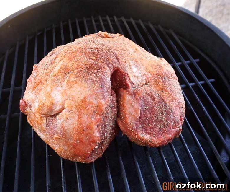 Grilled Australian Leg of Lamb Roast Recipe 5 uncooked lamb roast setting on a black grill grate