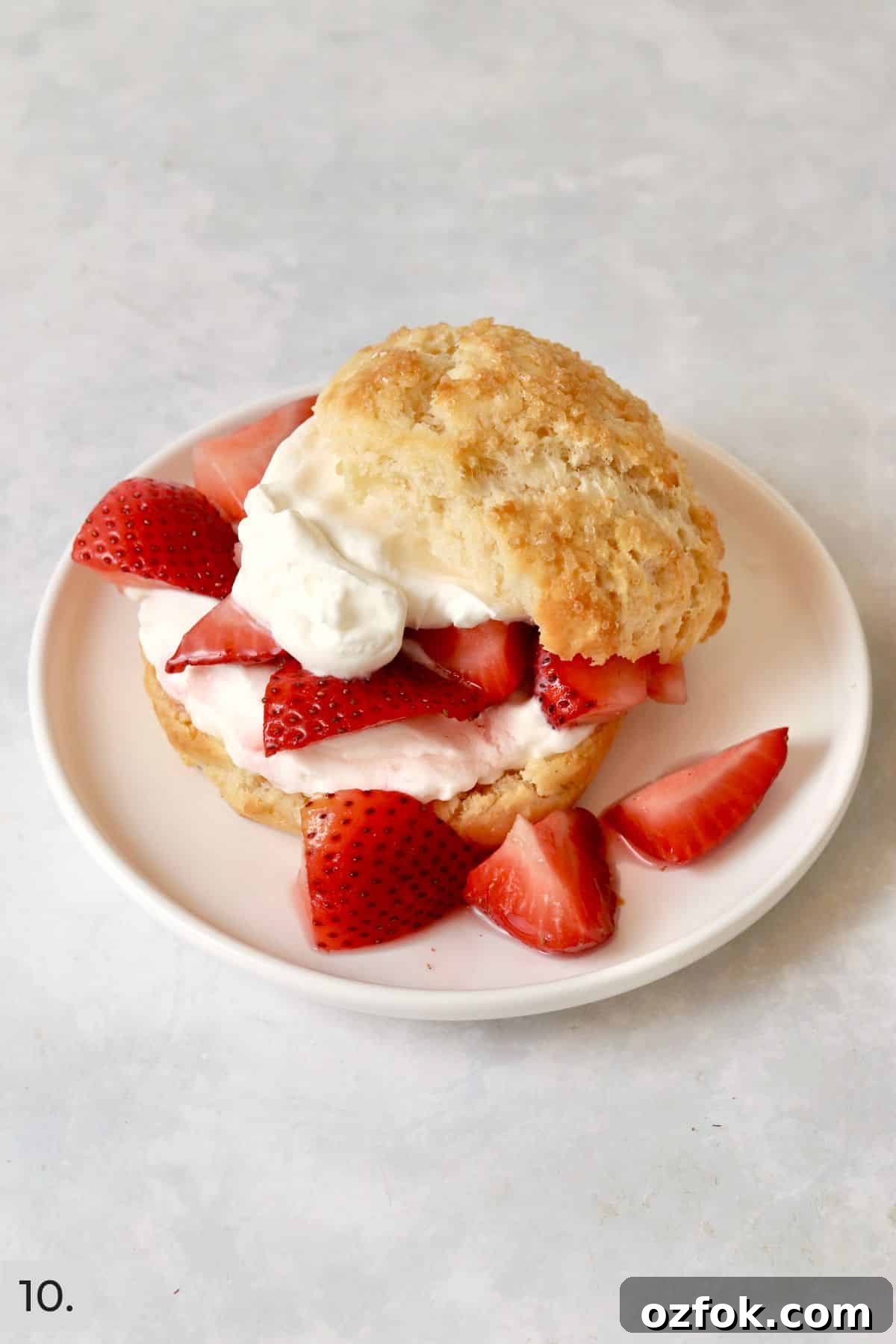 Strawberry Shortcake for Two: Individual Single-Serve Recipe 13 Single serve strawberry shortcake with whipped cream on a plate.