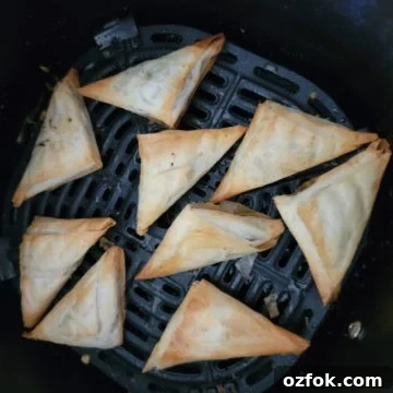 air fried spanakopita in the air fryer basket