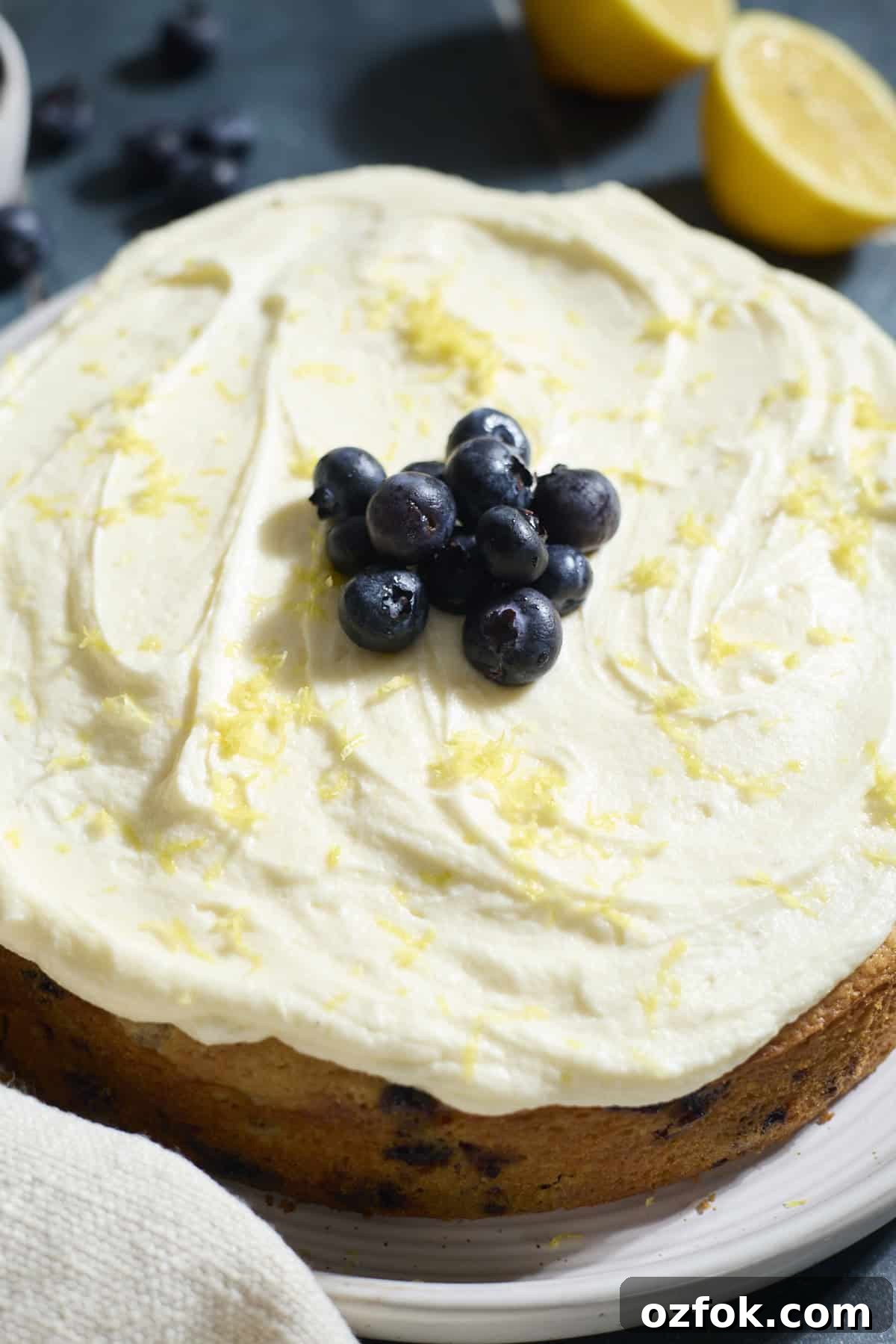 Blueberries on top of the frosting.