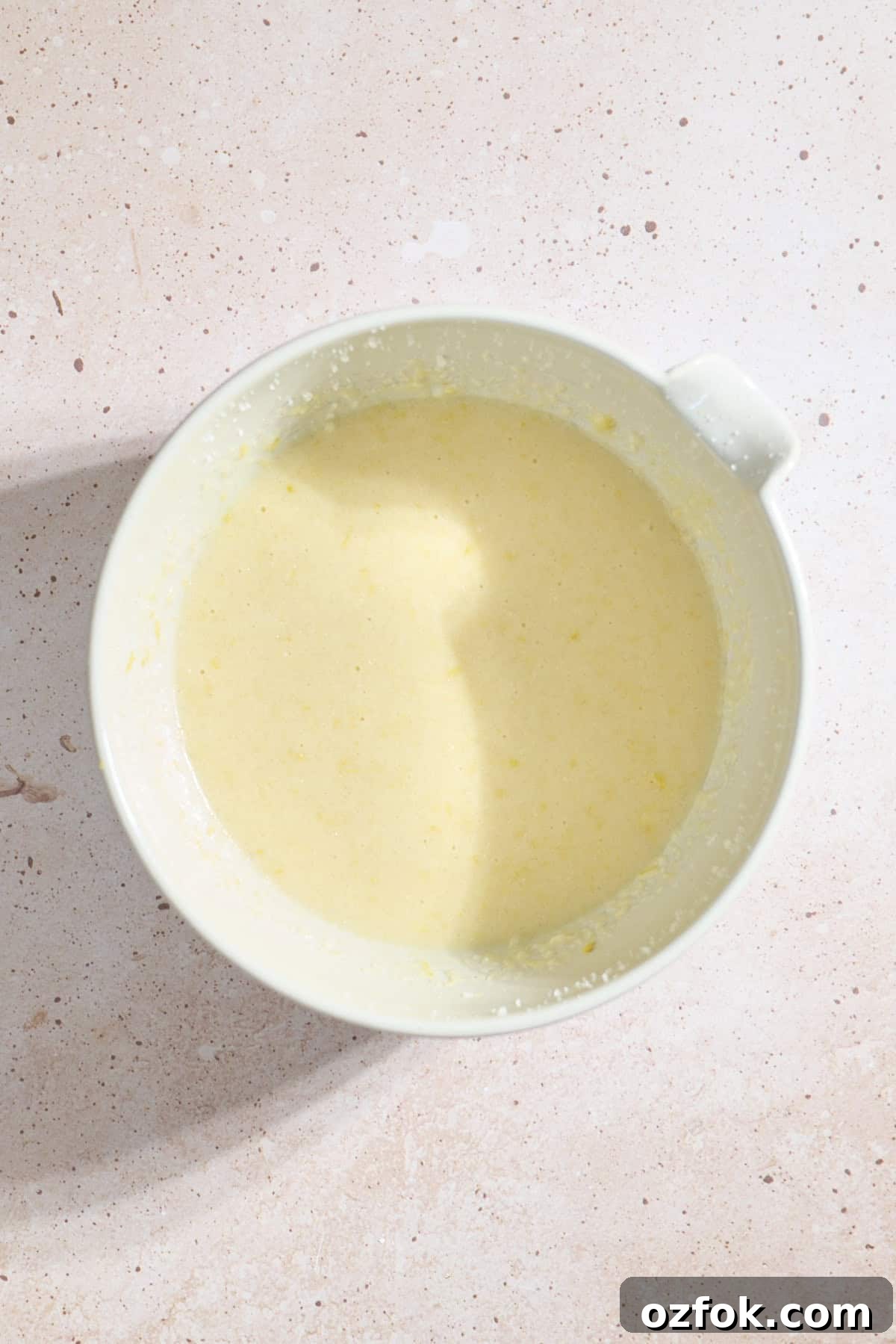Wet ingredients in a mixing bowl.