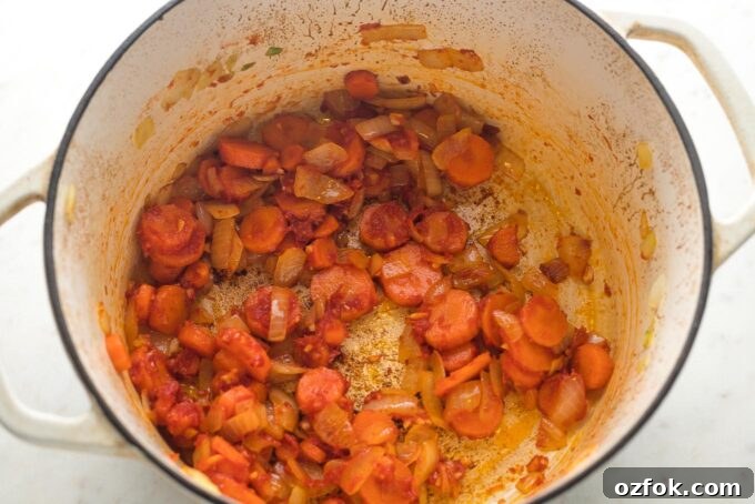 Carrots and onion cooking.