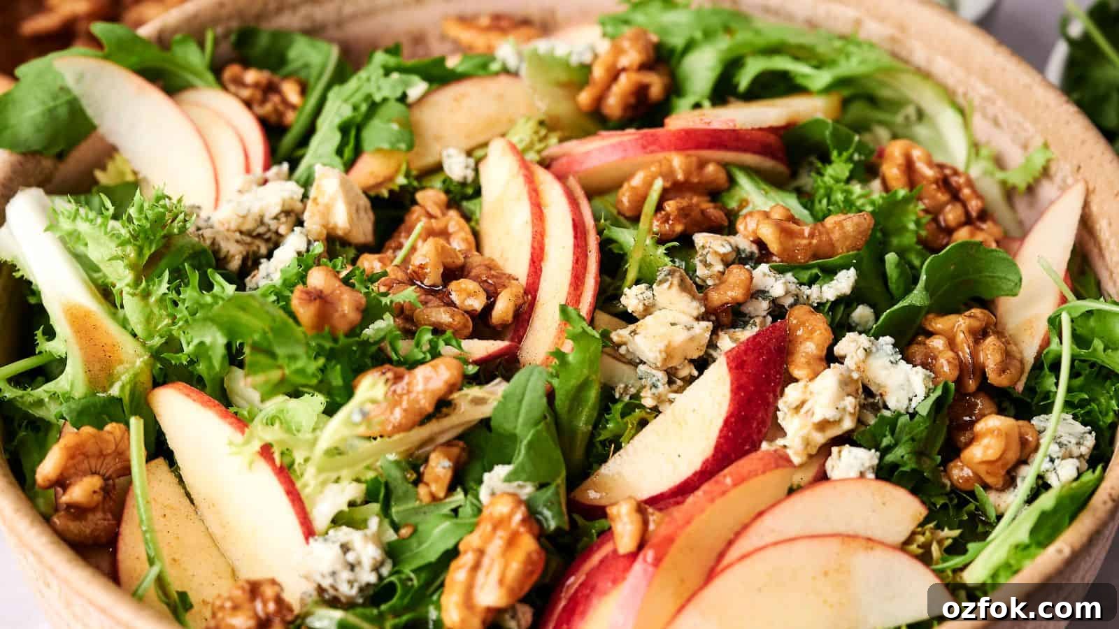 29 Irresistible Salad Recipes Everyone Will Love 29 A bowl of mixed greens salad with sliced Honeycrisp apples, walnuts, and crumbled blue cheese.