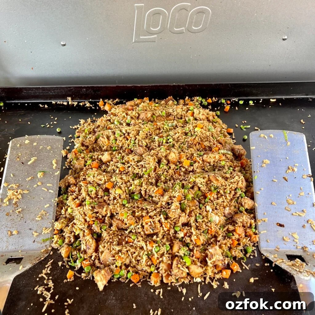 Classic Chicken Fried Rice Recipe: Quick Weeknight Dinner 2 Chicken fried rice on griddle