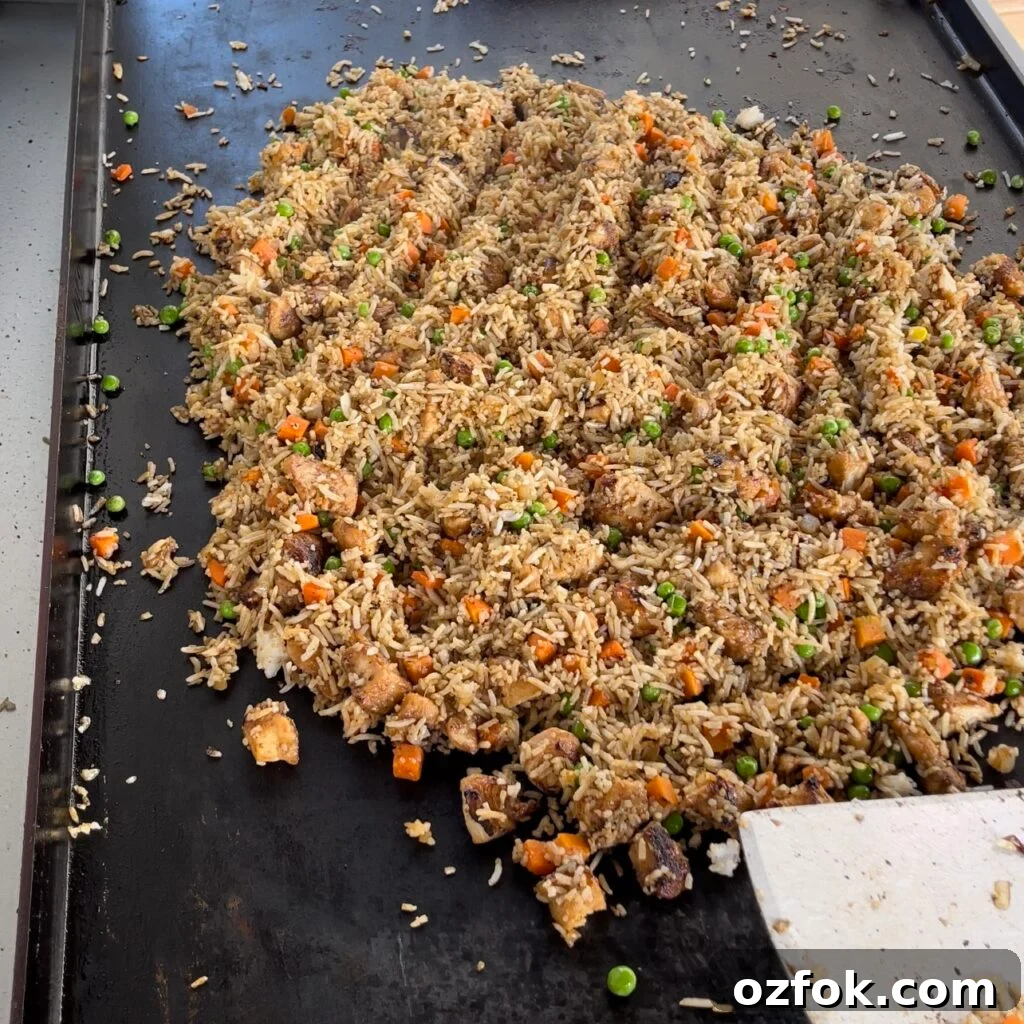 Classic Chicken Fried Rice Recipe: Quick Weeknight Dinner 4 Fried rice on griddle