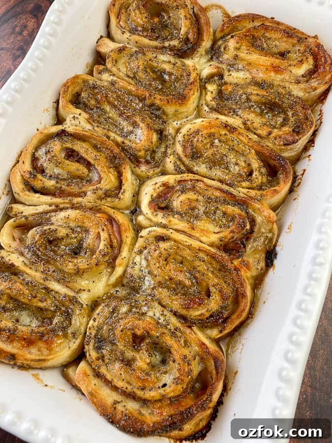 Warm ham roll-ups with glaze baked in 9x13 pan