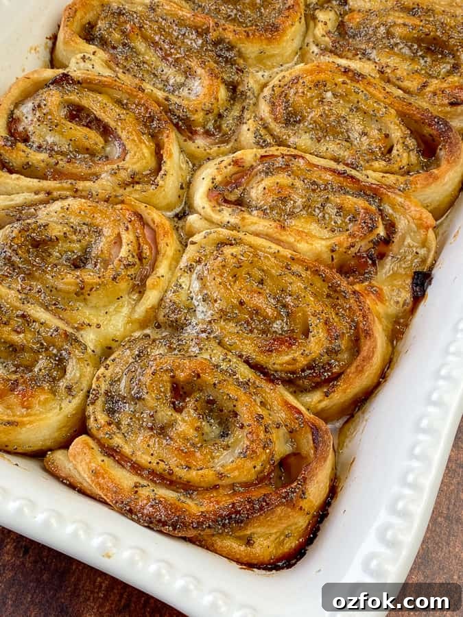 Baked ham and cheese roll-up with thin crust pizza dough