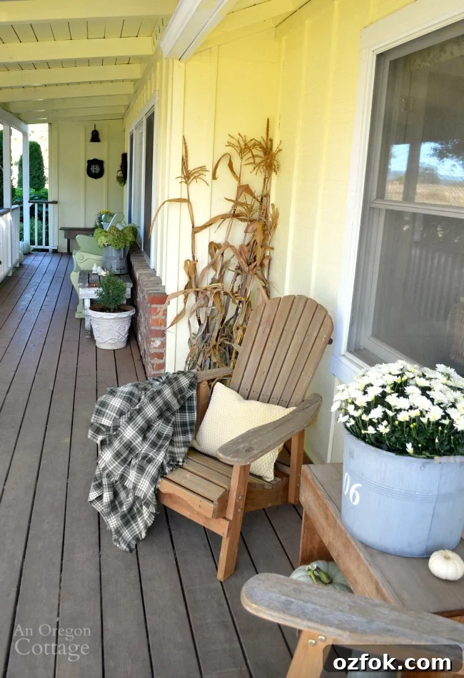 Natural Neutral Fall Porch Decorating Ideas for Cozy Curb Appeal 2 Easy Fall Porch Decorating using green, yellow, and white.