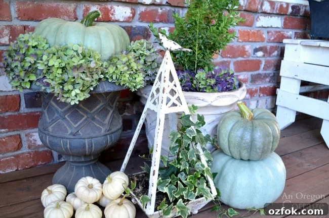 Natural Neutral Fall Porch Decorating Ideas for Cozy Curb Appeal 7 Fall Porch 2015-green and white pumpkin topiaries with hydrangeas
