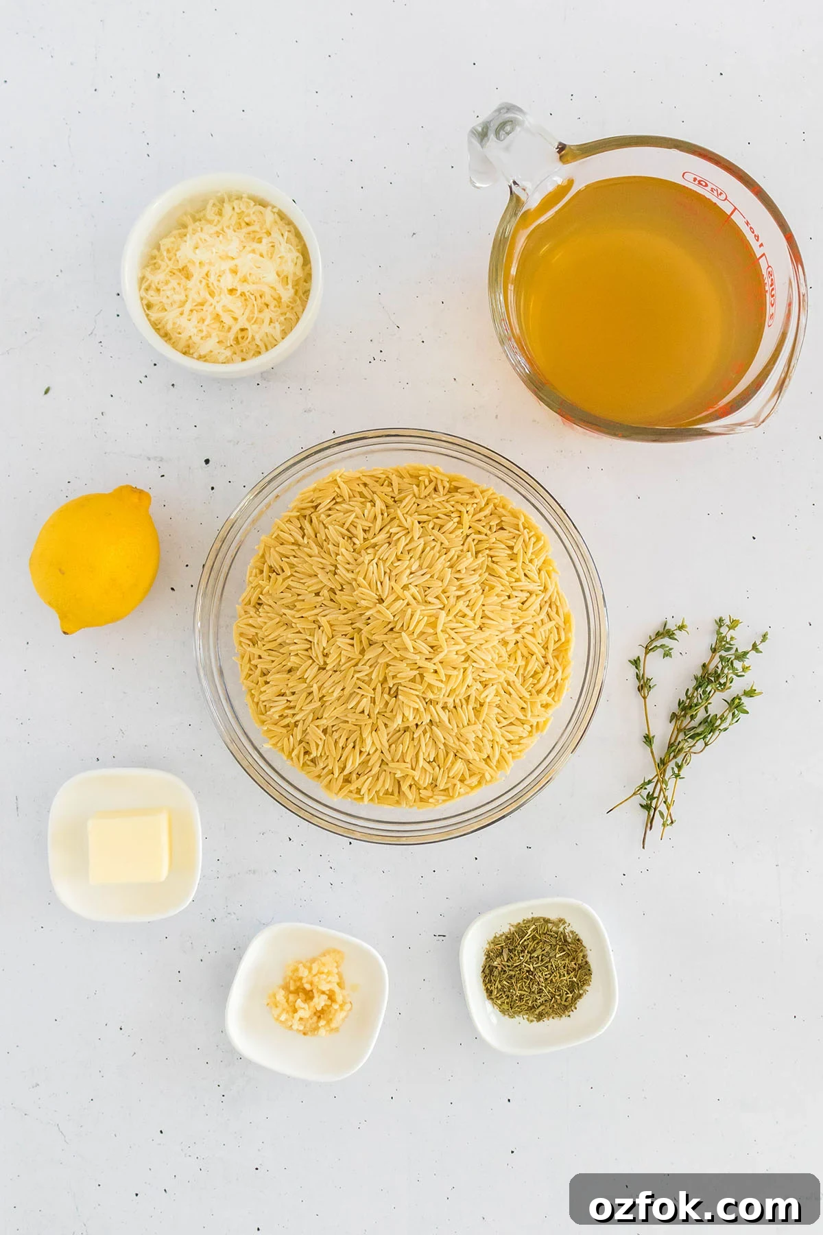 Zesty Lemon Orzo with Parmesan and Fresh Herbs 3 Ingredients to make lemon orzo set out on the counter.