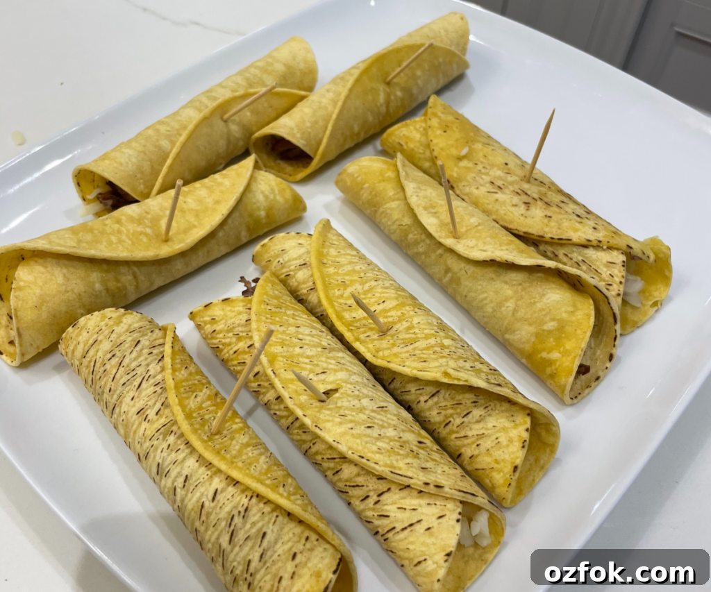 Slow-Braised Beef Taquitos with Tangy Salsa Verde Recipe 3 Rolled taquitos