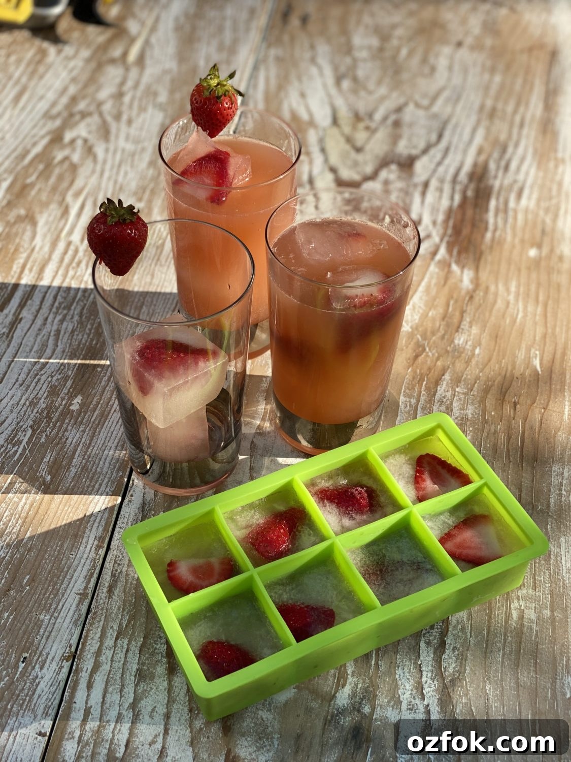 Close-up of strawberry lemonade with fruit