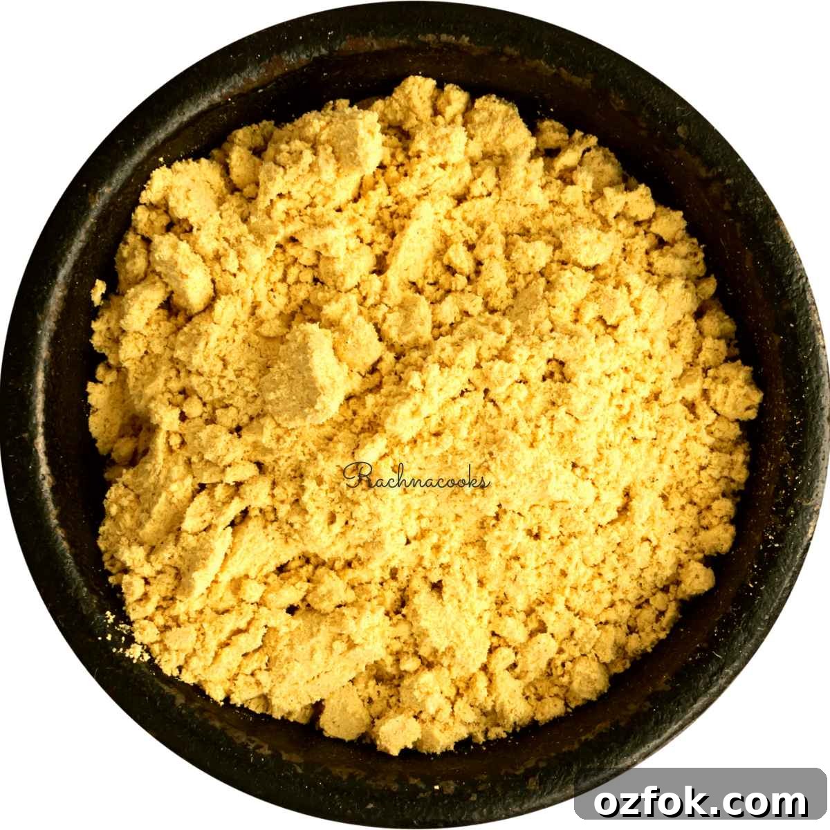 7 Alternatives to Black Mustard Seeds for Cooking and Pickling 5 Mustard powder in a black bowl.
