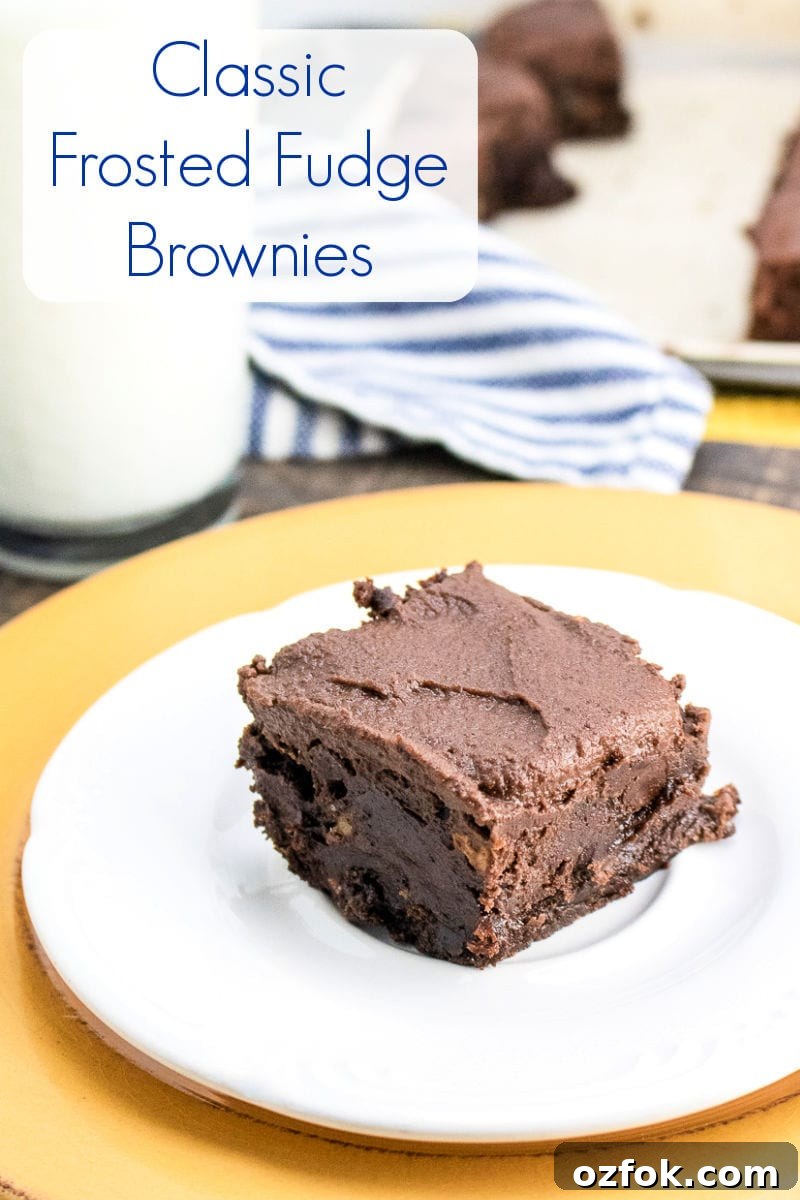 pin classic frosted brownie on plate