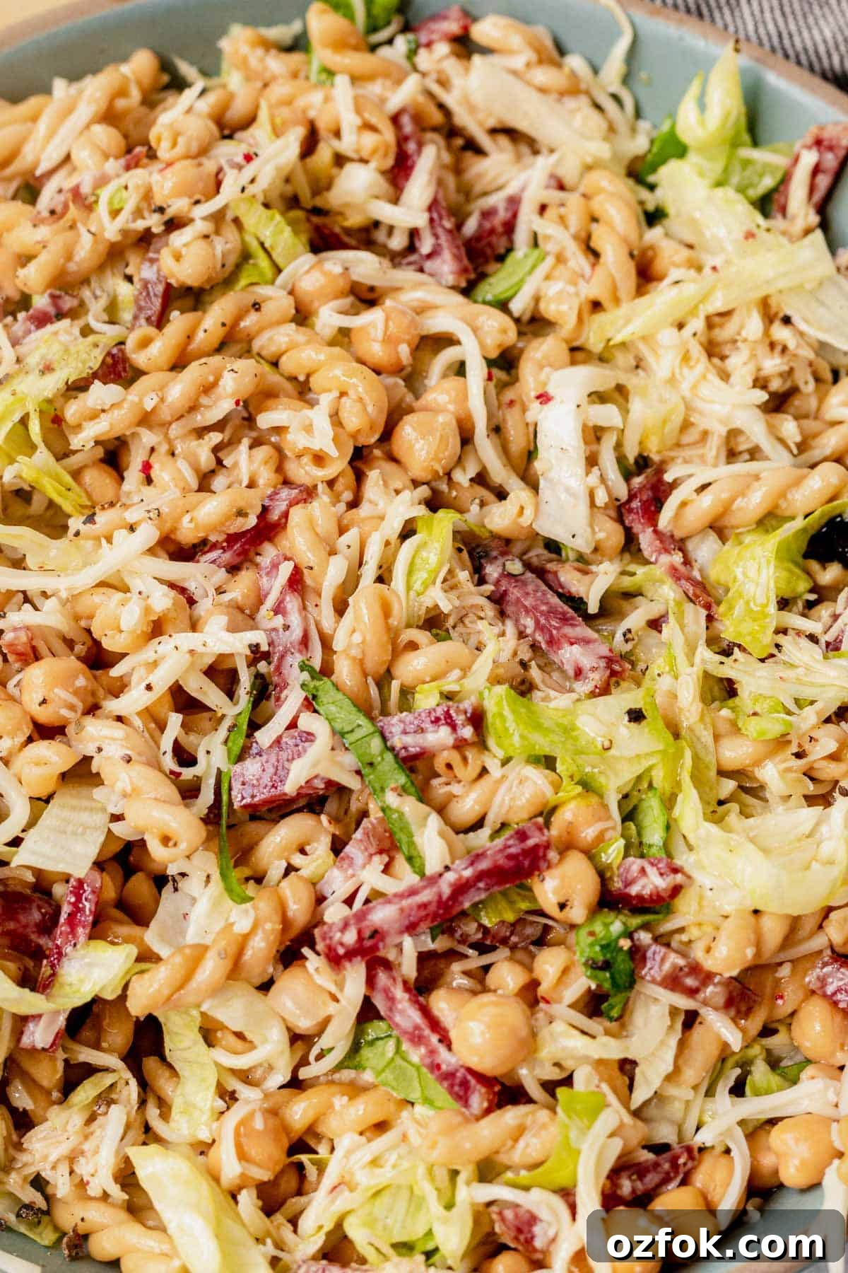 Italian pasta salad with salami in a bowl