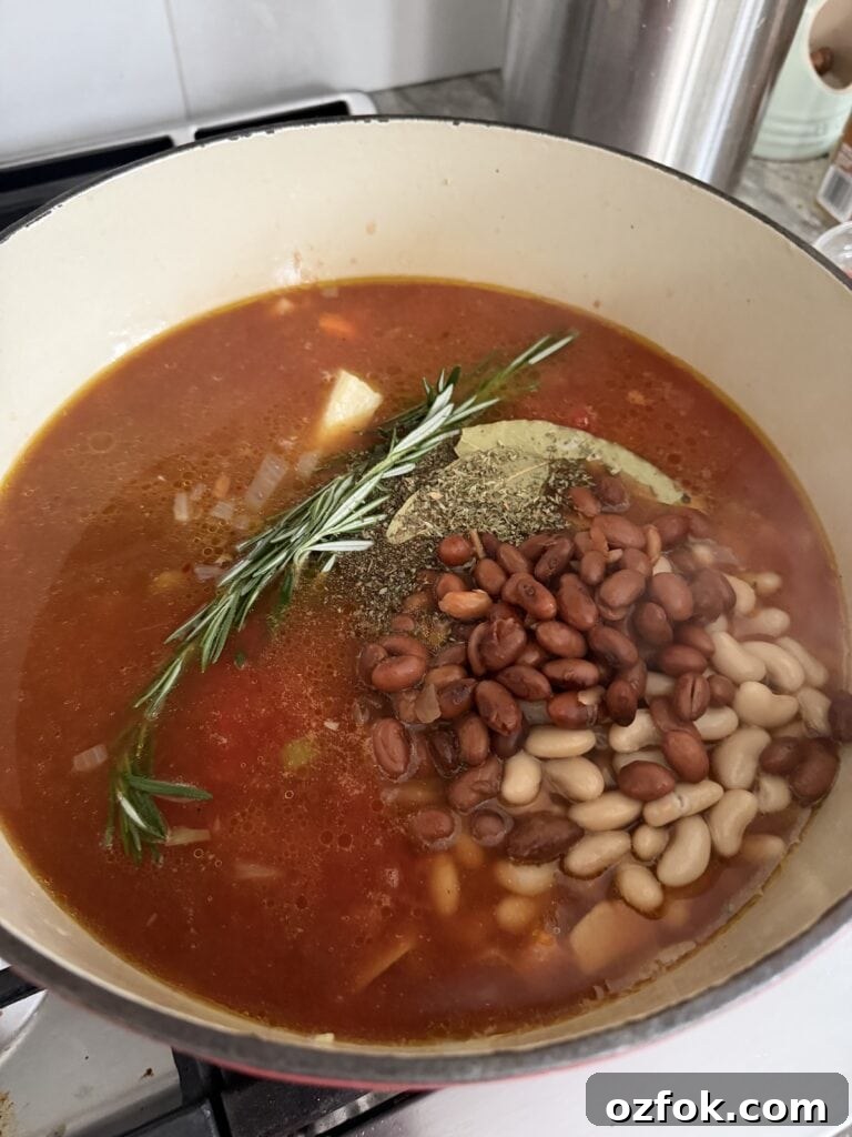 Classic Italian Minestrone Soup Recipe — Hearty Vegetable Stew 10 Dutch oven with soup ingredients ready to simmer.
