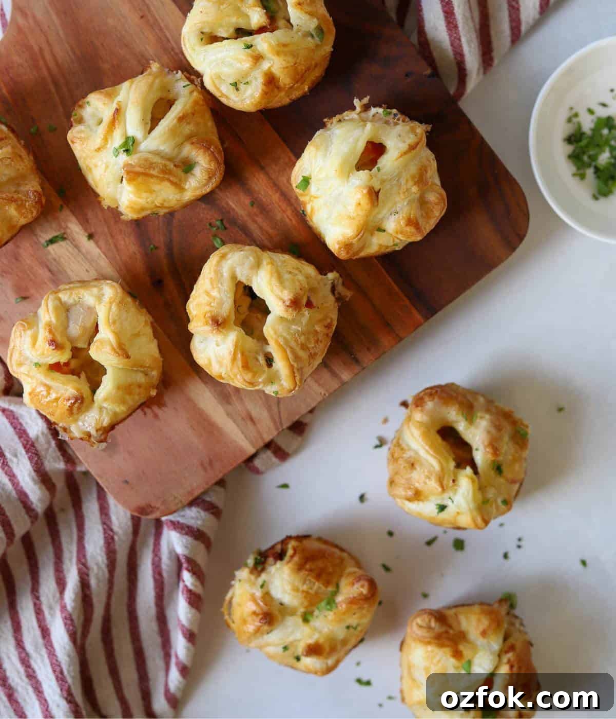 12 Quick Weeknight Dinners Made with Rotisserie Chicken 14 Mini chicken pot pies on serving platter.
