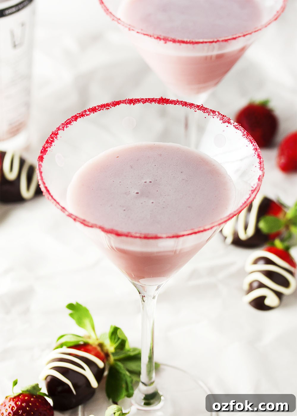 Chocolate-Dipped Strawberry Martini Recipe & Serving Tips 3 Chocolate Covered Strawberry Martini - Intense strawberry flavor is balanced with chocolate and a bit of cream which combine to make an amazing chocolate strawberry martini that is perfect for a romantic night in or a girl's night get-together.