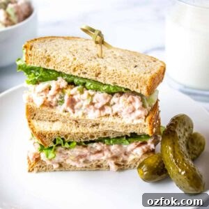 Classic Creamy Ham Salad Recipe for Sandwiches and Dips 12 A stacked sandwich filled with deviled ham and lettuce.