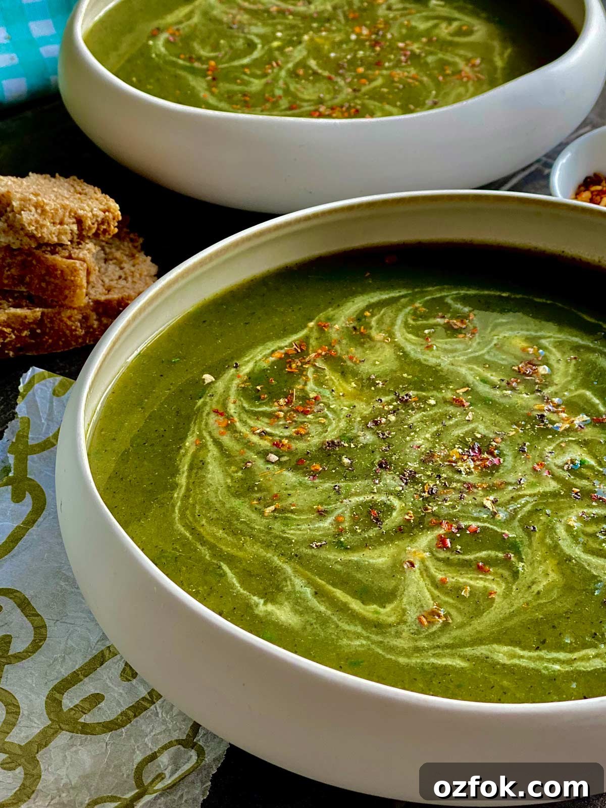 Wild Garlic and Nettle Soup Recipe: Creamy Spring Foraging Bowl 5 Two soup bowls containing nettle soup and freshly foraged wild garlic