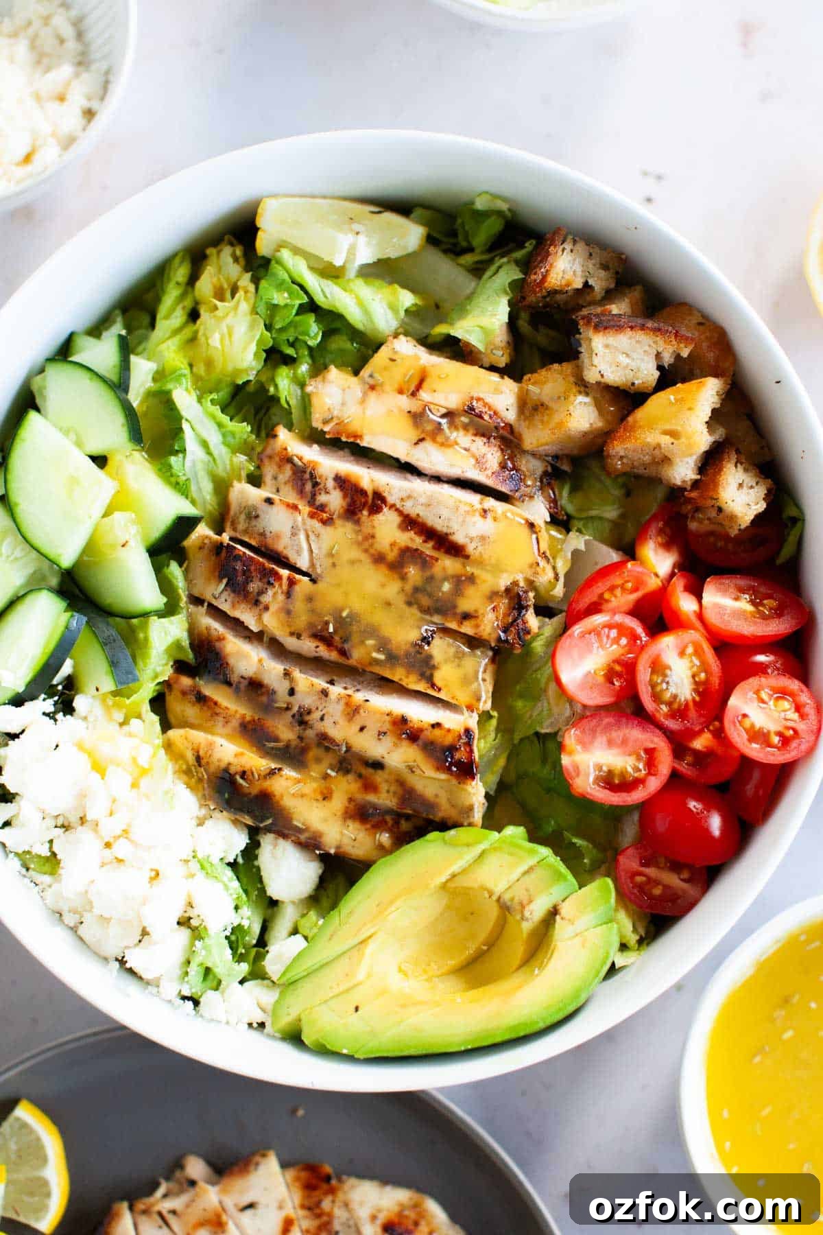Grilled chicken salad with honey vinaigrette.