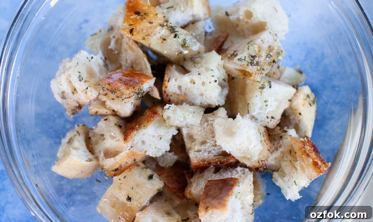 Homemade croutons in a glass bowl.
