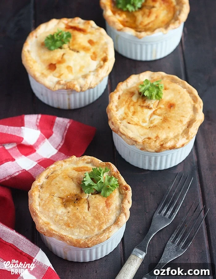 Authentic Cajun Crawfish Pie Recipe: Southern Comfort Dish 2 three baked crawfish pies on a wooden background with a red plaid napkin