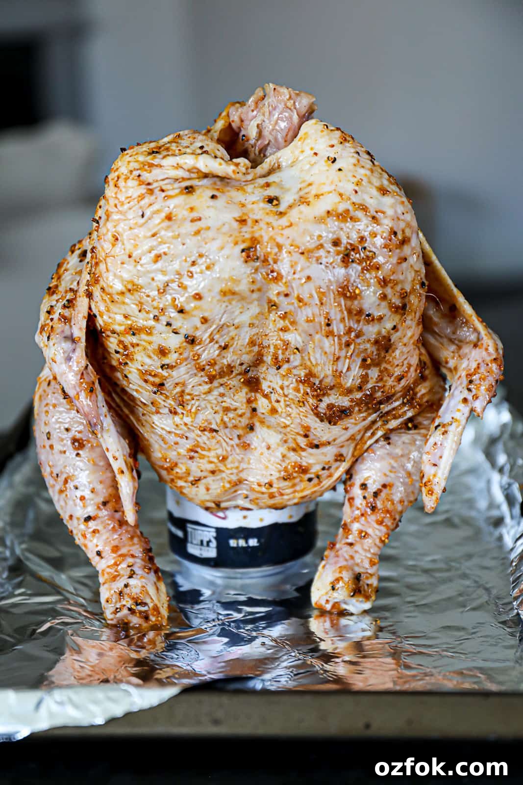 Pellet Smoker Beer-Can Chicken Recipe for Juicy, Crispy Skin 5 Seasoned whole chicken on a can of beer